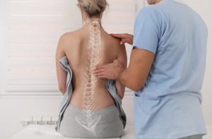 a woman with scoliosis