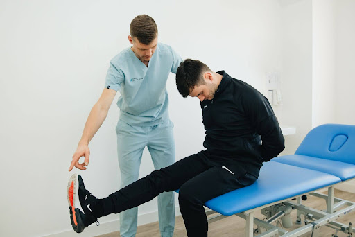 A patient is doing physiotherapy